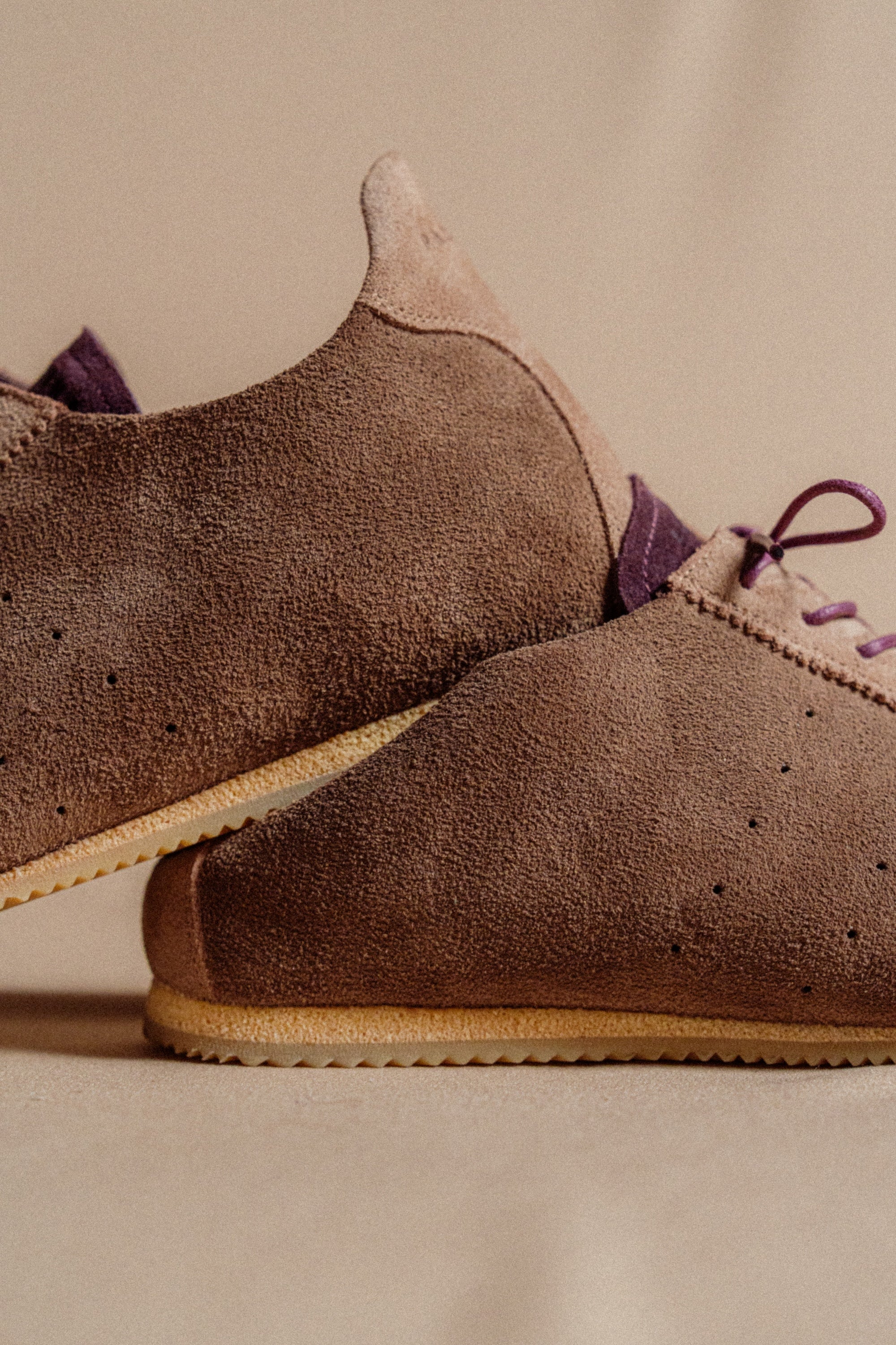 Brown and burgundy suede