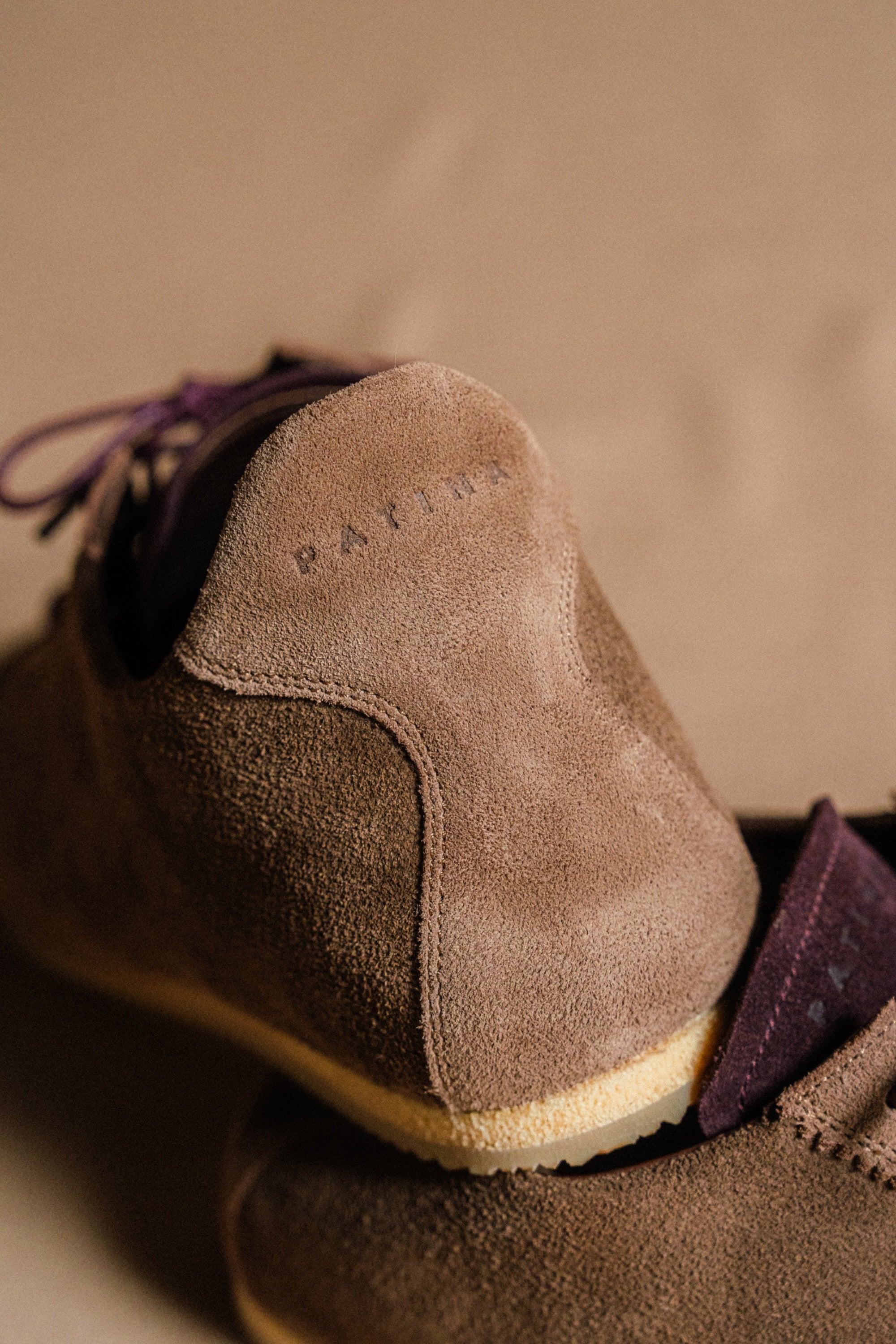 Brown and burgundy suede